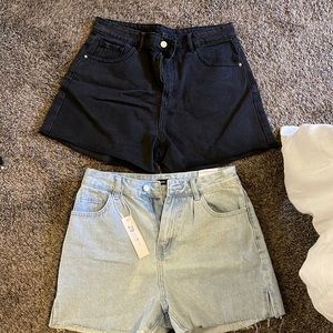 Blue and black high waist, mid tight jean shorts!